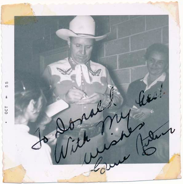 Item #25810 Inscribed Photograph Signed. Gene AUTRY.
